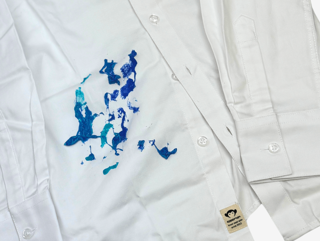 Stylish white shirt with colorful slime stain, perfect for kids’ fashion tips and stain removal solutions.