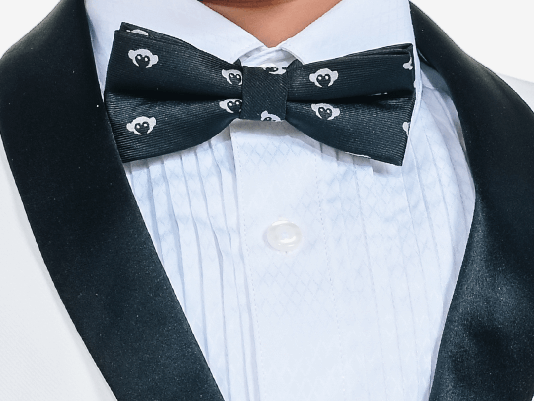 Stylish boy's tuxedo with a chic black bow tie—ideal for summer weddings and family celebrations!