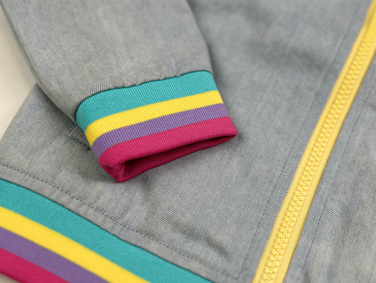 Stylish kids jacket cuff with vibrant colors, perfect for adding flair to any outfit this spring.