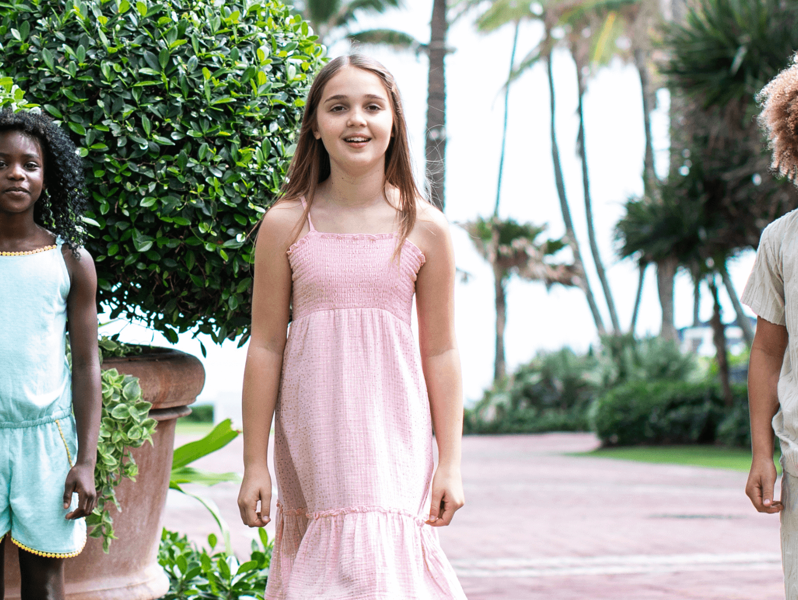 Stylish kids showcase Appaman's fun summer outfits, perfect for adventures under the sun.