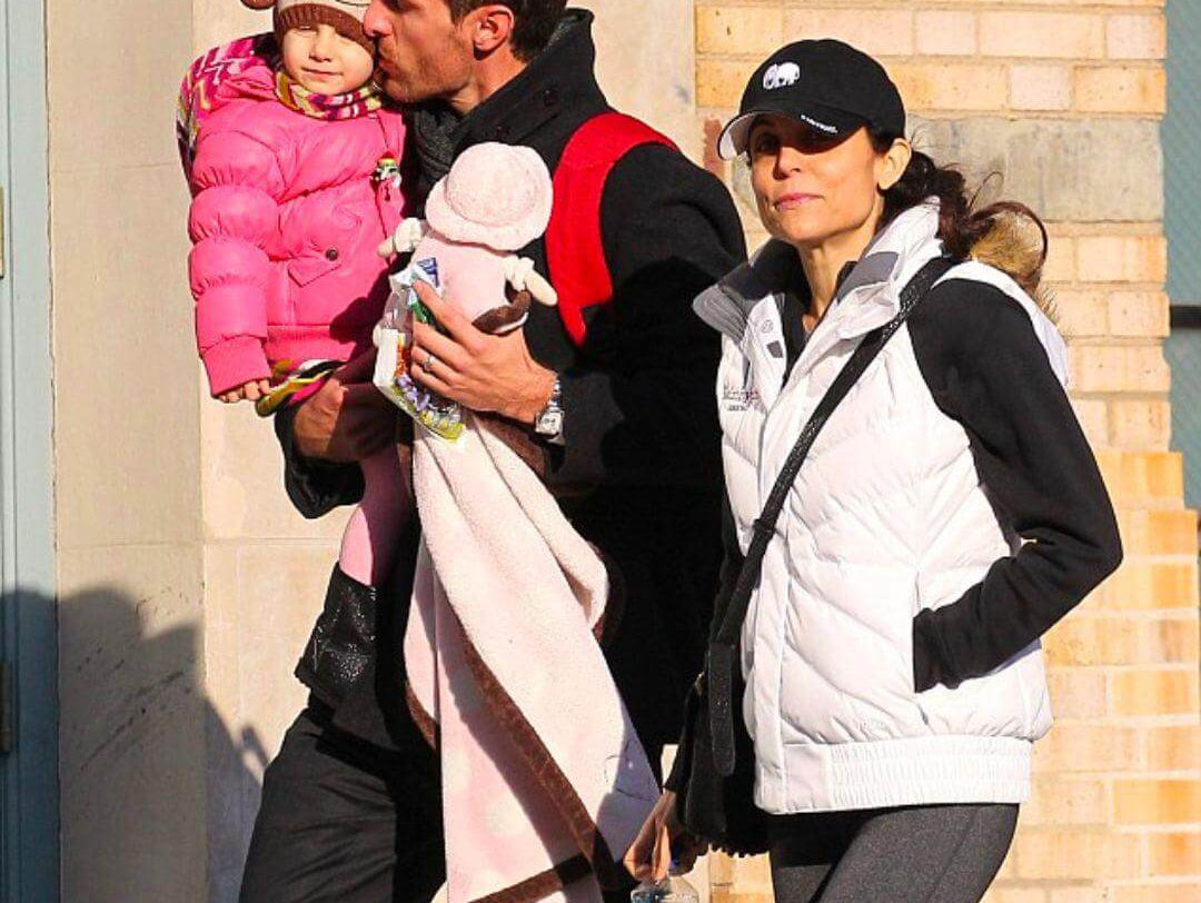 Bethenny Frankel and Jason Hoppy stylishly stroll with daughter Bryn, showcasing kids' winter fashion in Appaman.