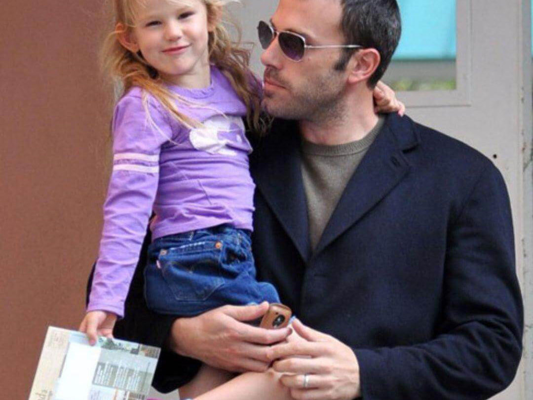 Violet Affleck styles an Appaman tee, flashing a smile with her dad Ben Affleck on a fun outing in Los Angeles.