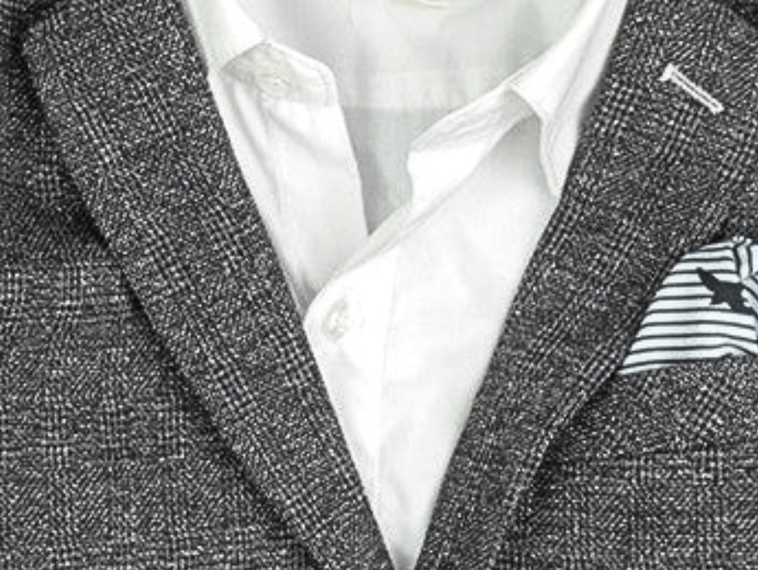 Stylish grey blazer with a crisp shirt and a playful pocket square, perfect for kids' sophisticated looks.