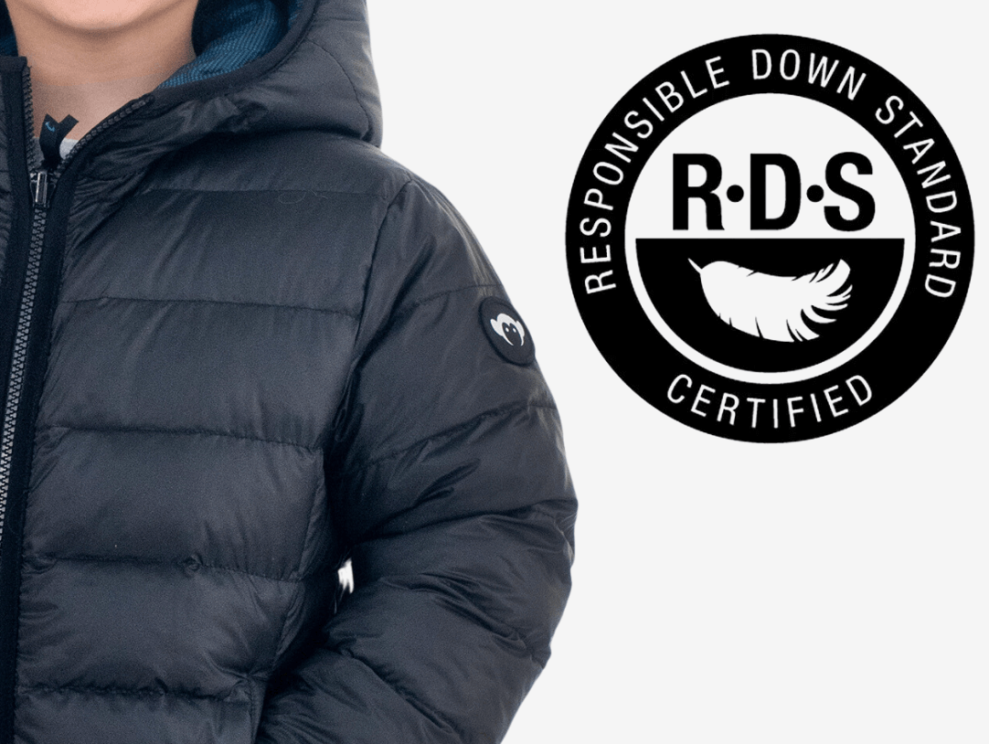 Stylish child wearing an RDS certified down jacket, showcasing Appaman's commitment to responsible fashion.