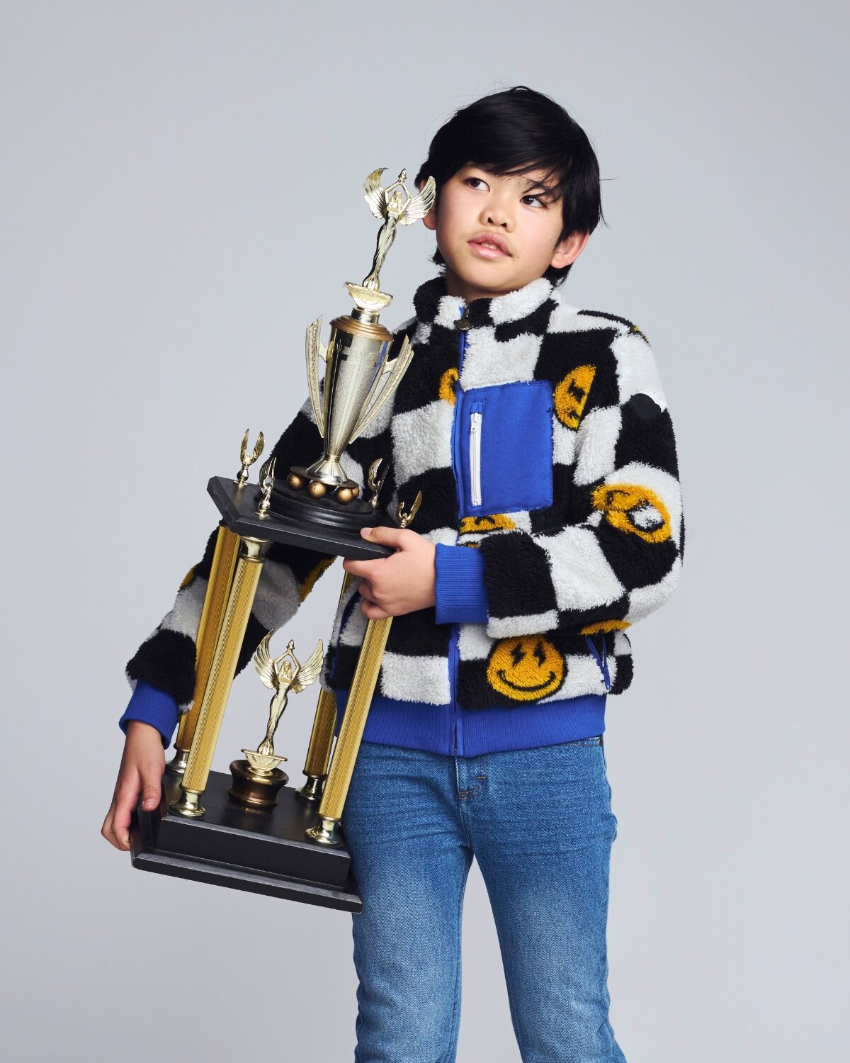 Boys' Jackets & Vests featuring a color-blocked puffer vest on a young model showcasing trendy winter wear.