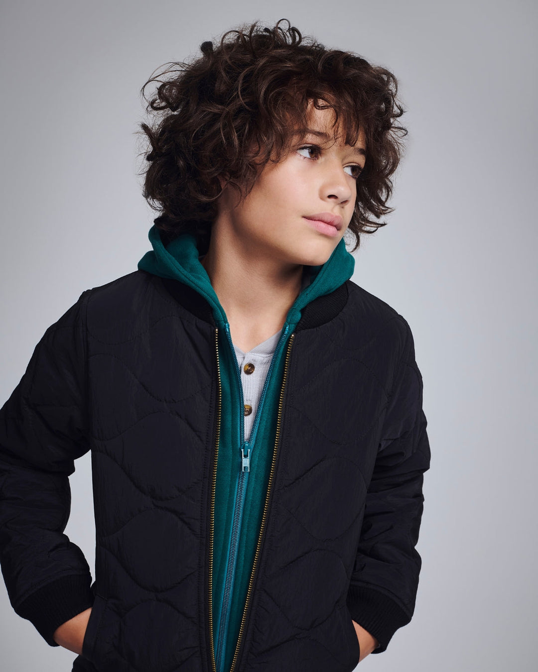 Stylish boy rocking a tie-dye sweatshirt and shorts, ready for fun in high-quality kids clothing from Appaman.