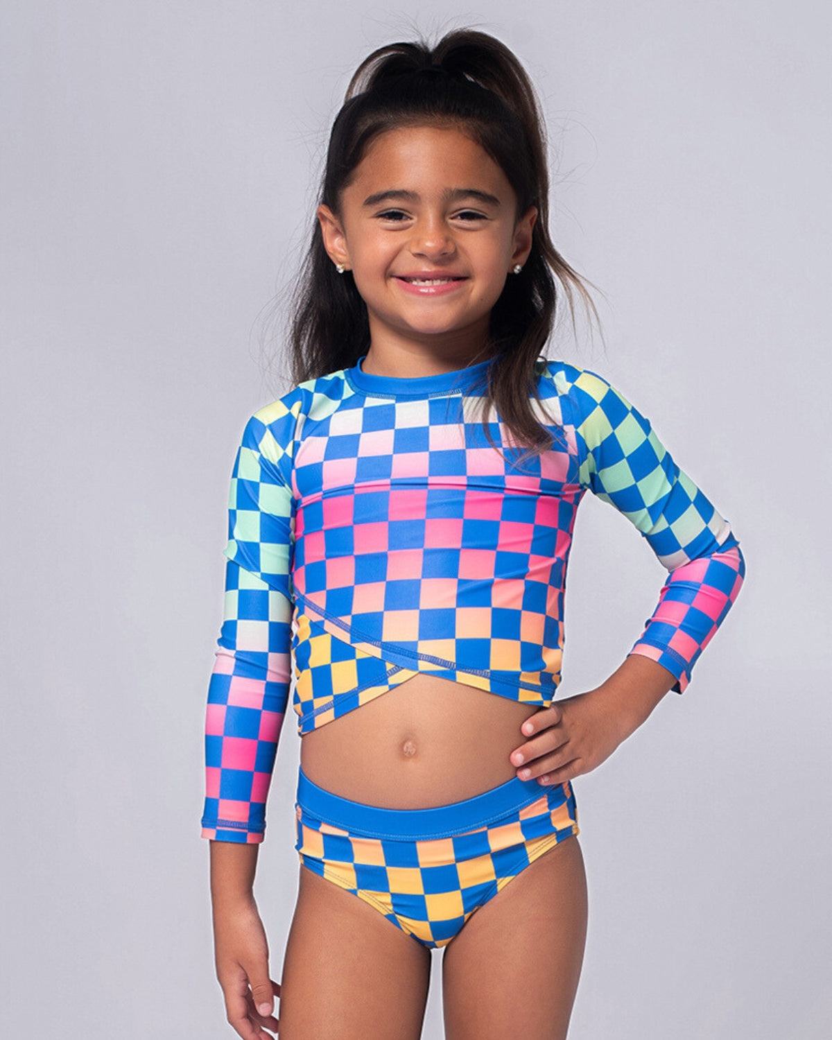 Girls' Rash Guards & Swim Shirts: Colorful swim shirt and bikini with a boogie board.