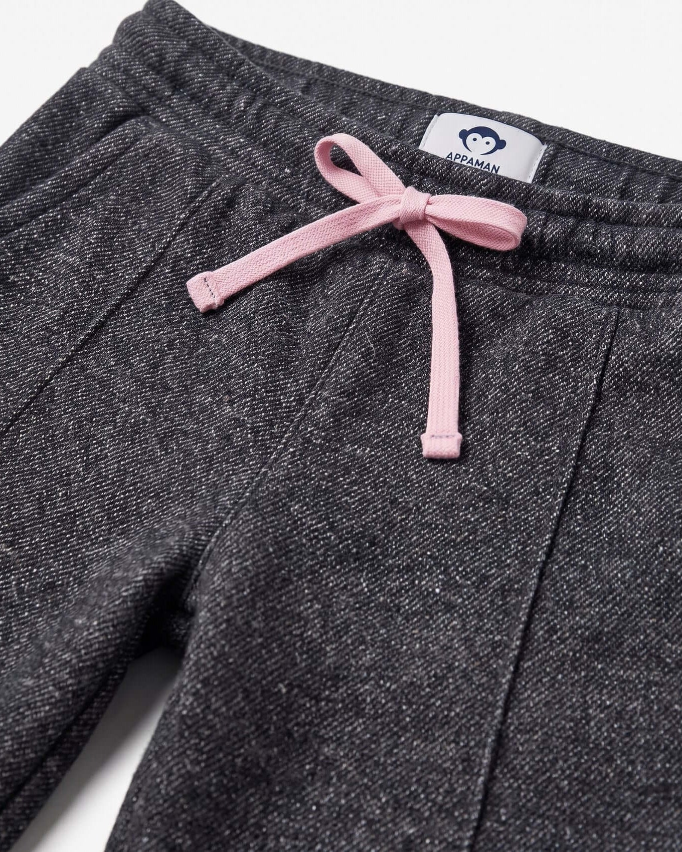 Dark gray sweatpants with a pink drawstring and Appaman label on a white background