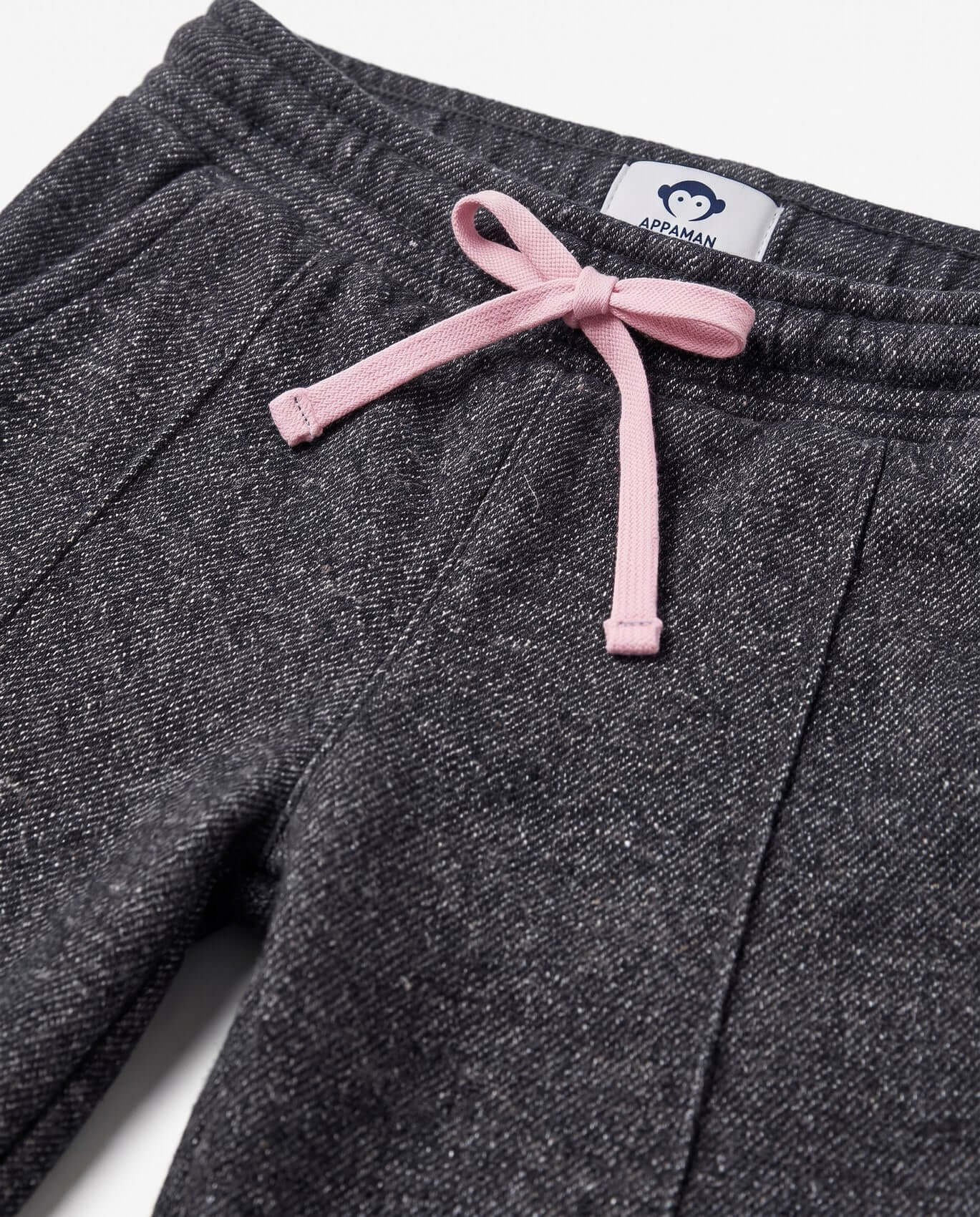 Dark gray sweatpants with a pink drawstring and Appaman label on a white background