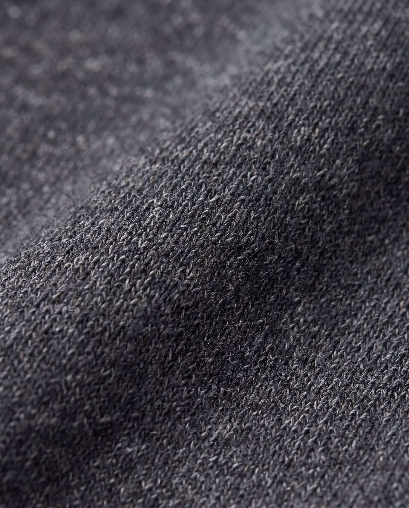 Close-up of dark gray fabric texture