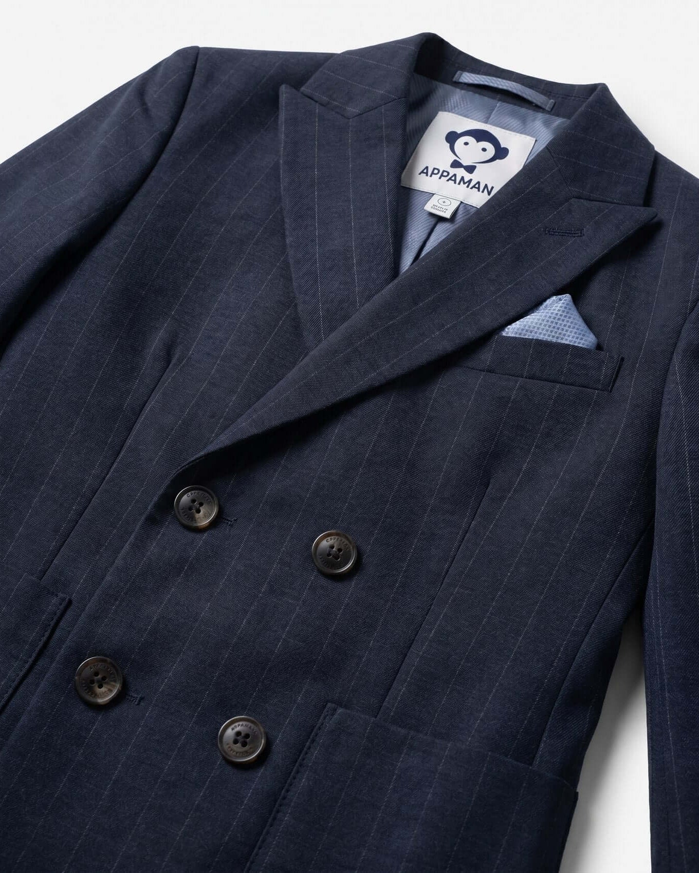 Navy pinstripe suit jacket with Appaman label on a white background