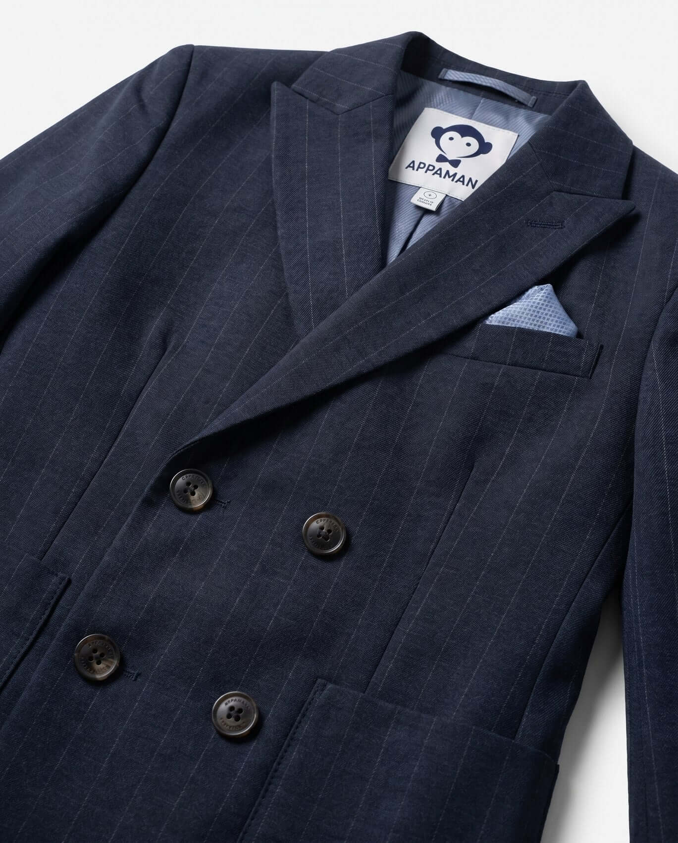 Navy pinstripe suit jacket with Appaman label on a white background