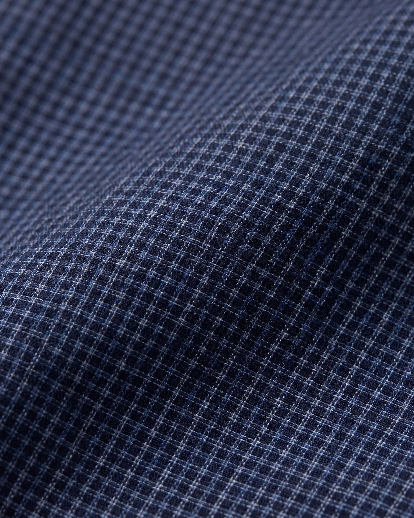 Close-up of blue checkered fabric texture