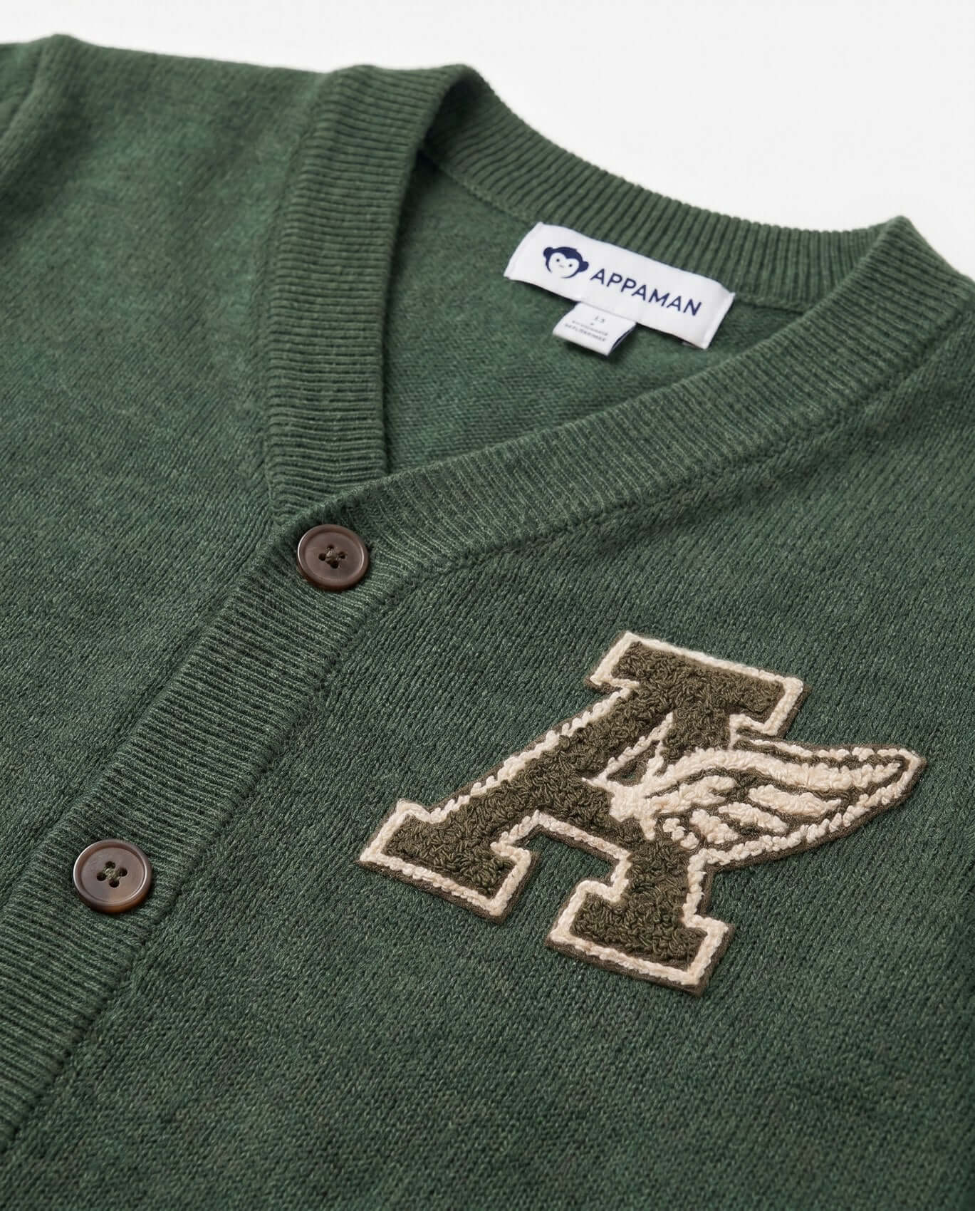 Green cardigan with embroidered logo and Appaman label