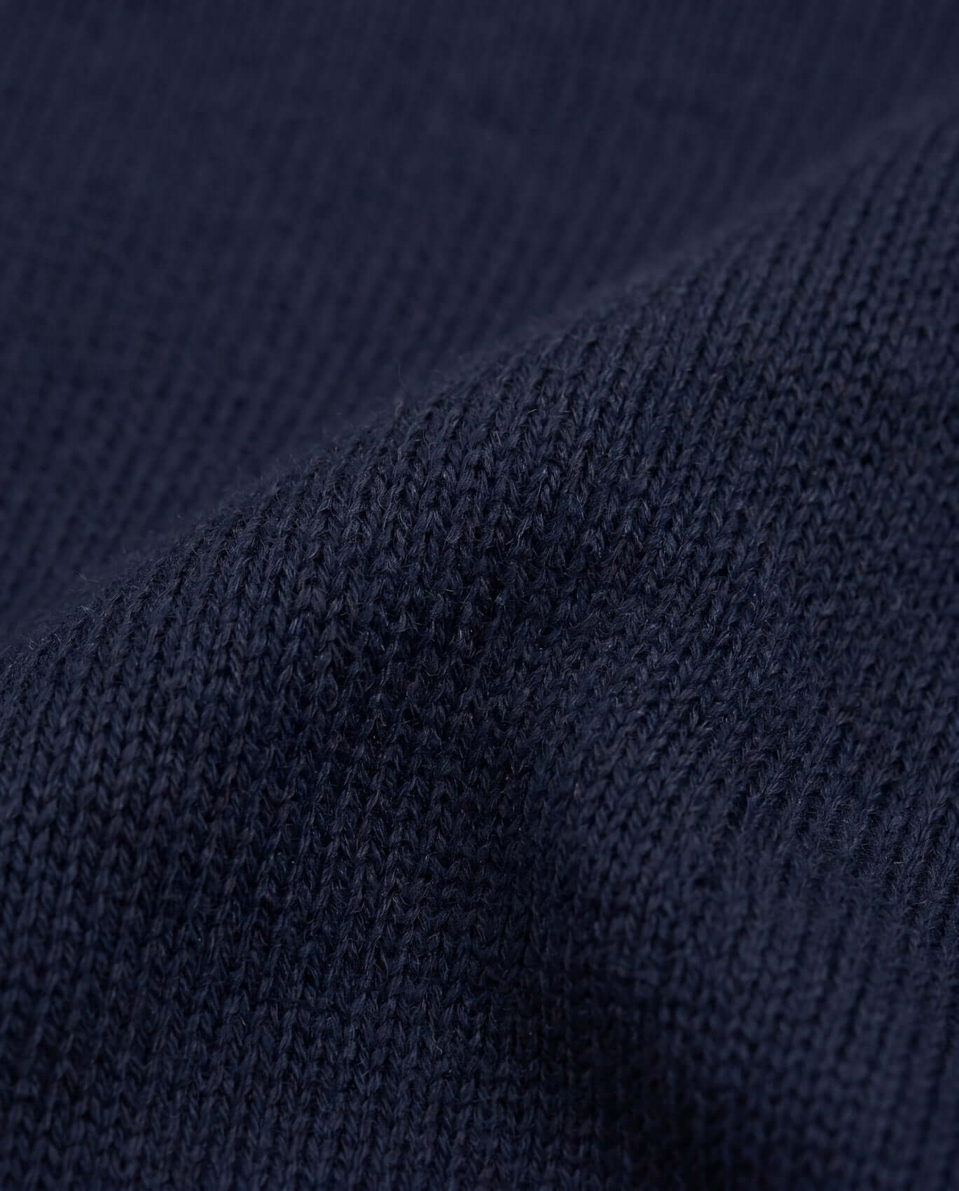 Close-up of dark blue fabric texture