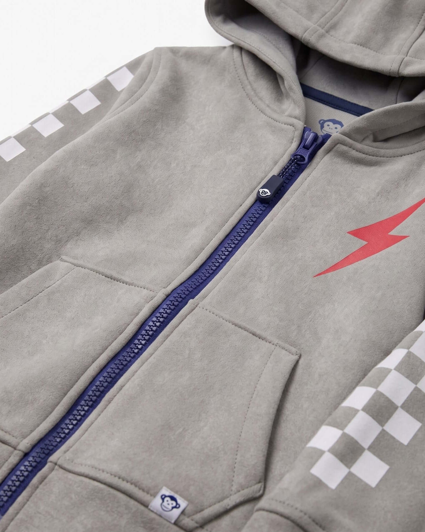 Gray hoodie with red lightning bolt design and checkered pattern on sleeve