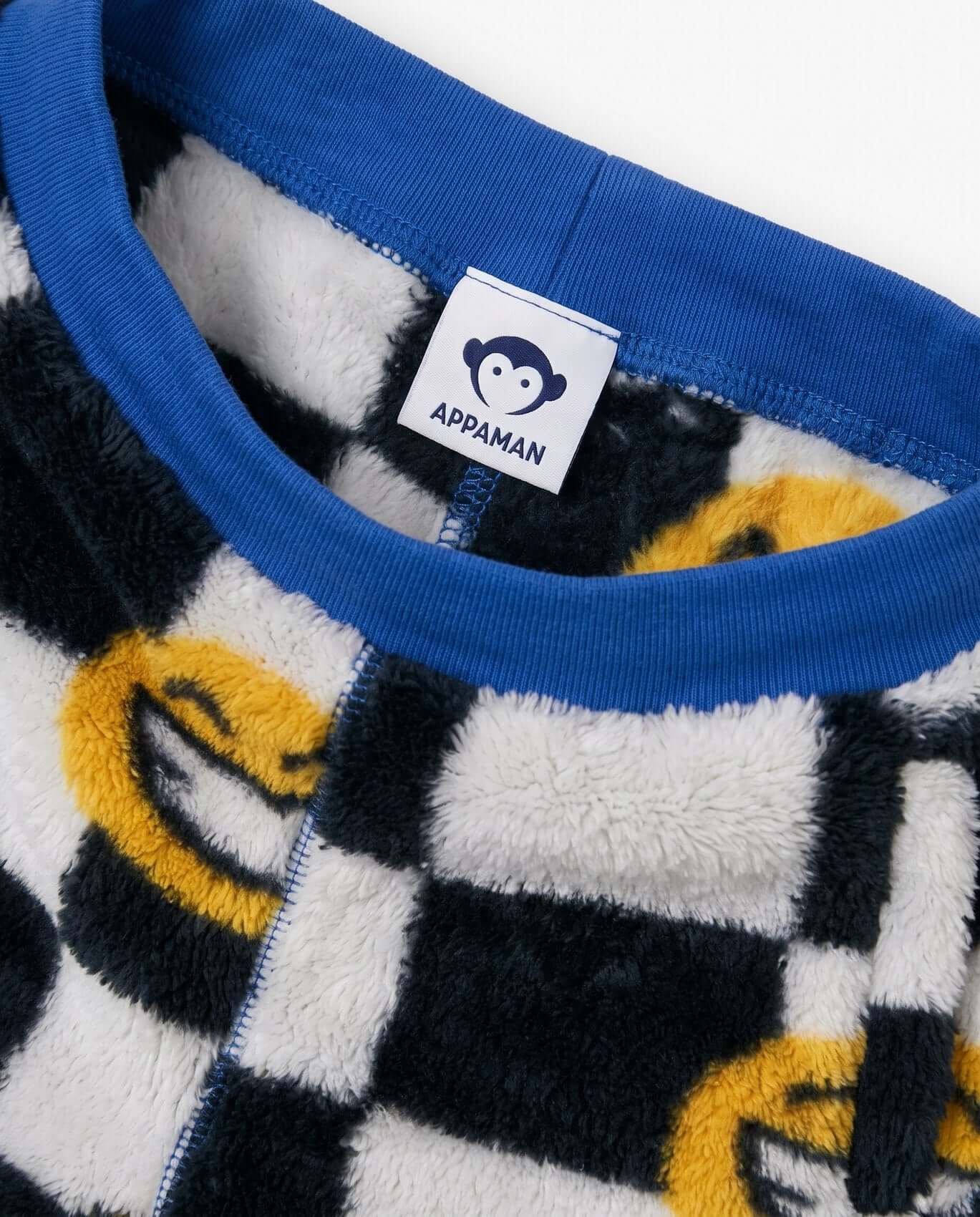Close-up of a children's fleece garment with Appaman label