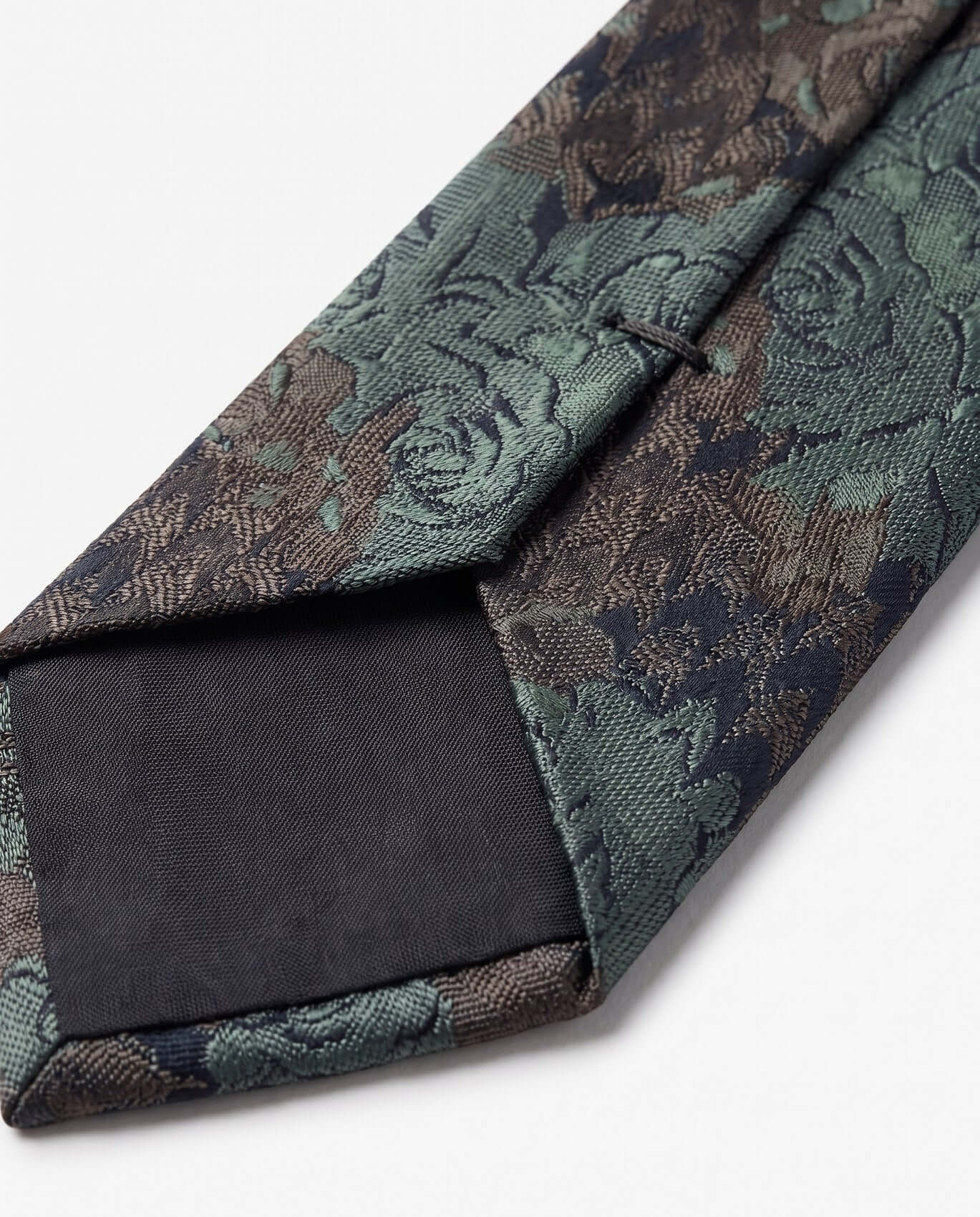 Floral patterned tie on a white background
