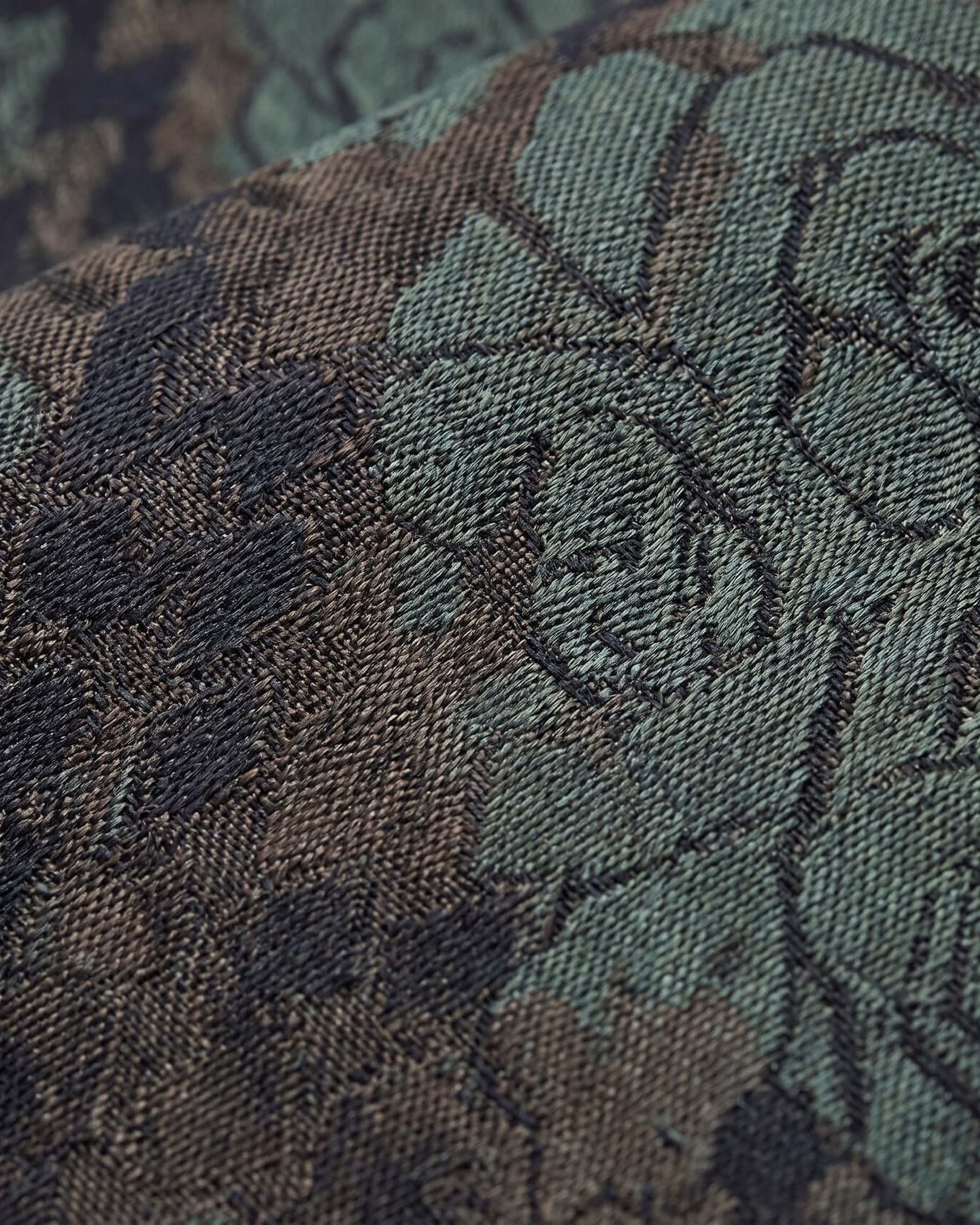 Close-up of a camouflage fabric with a detailed pattern