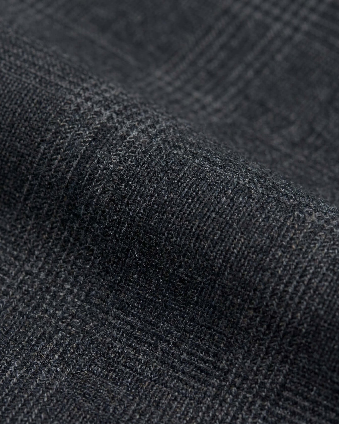 Close-up of dark gray textured fabric