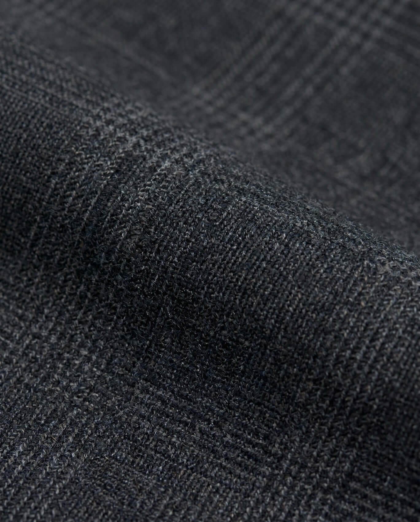 Close-up of dark gray textured fabric