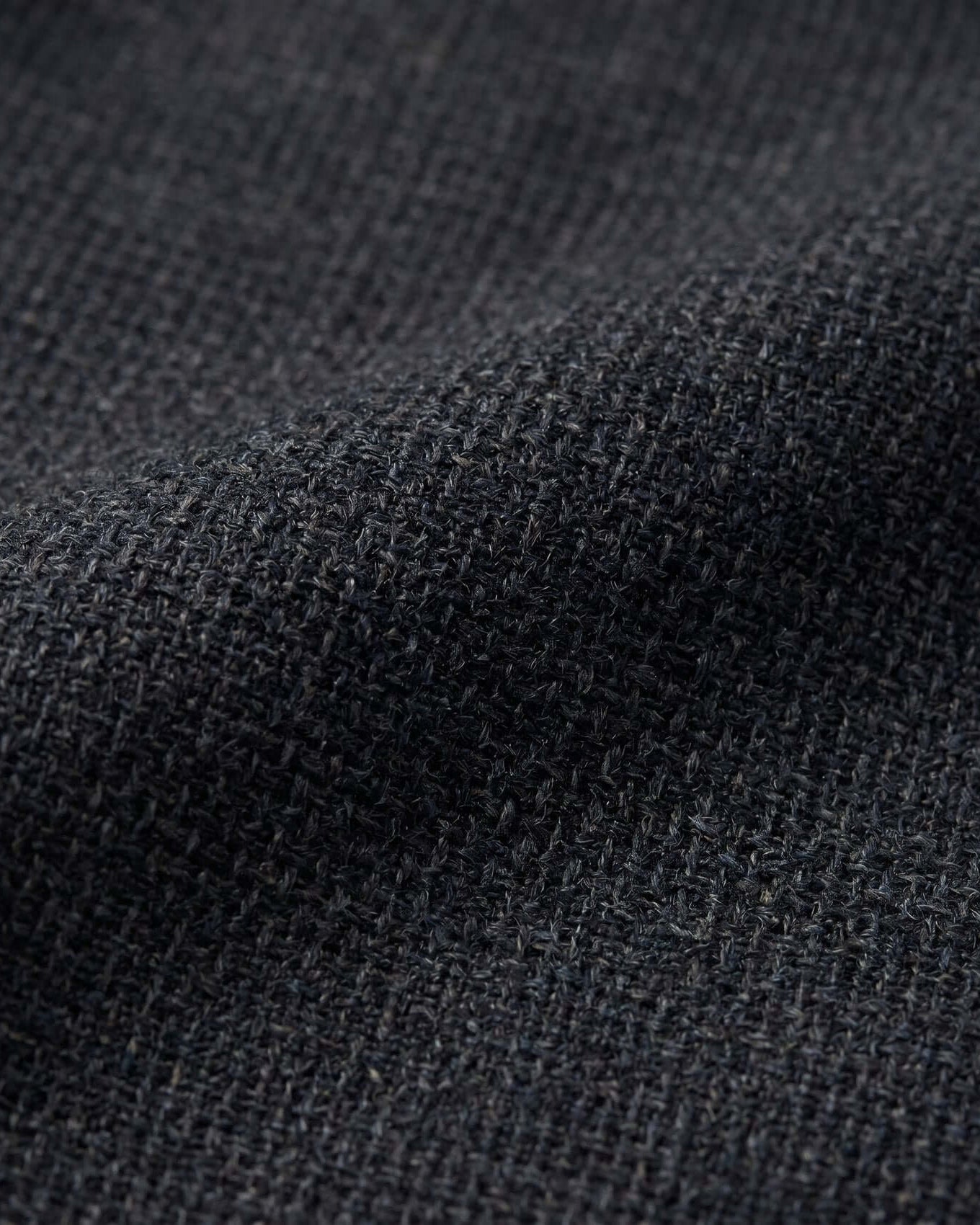 Close-up of dark gray fabric texture