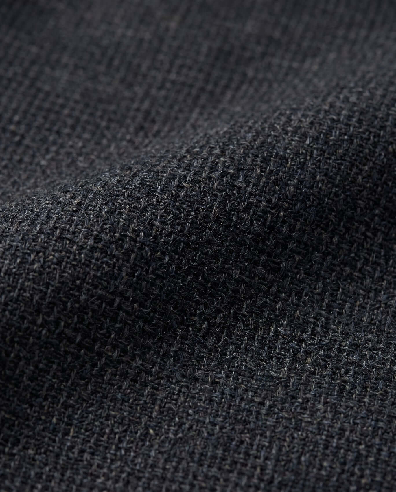 Close-up of dark gray fabric texture