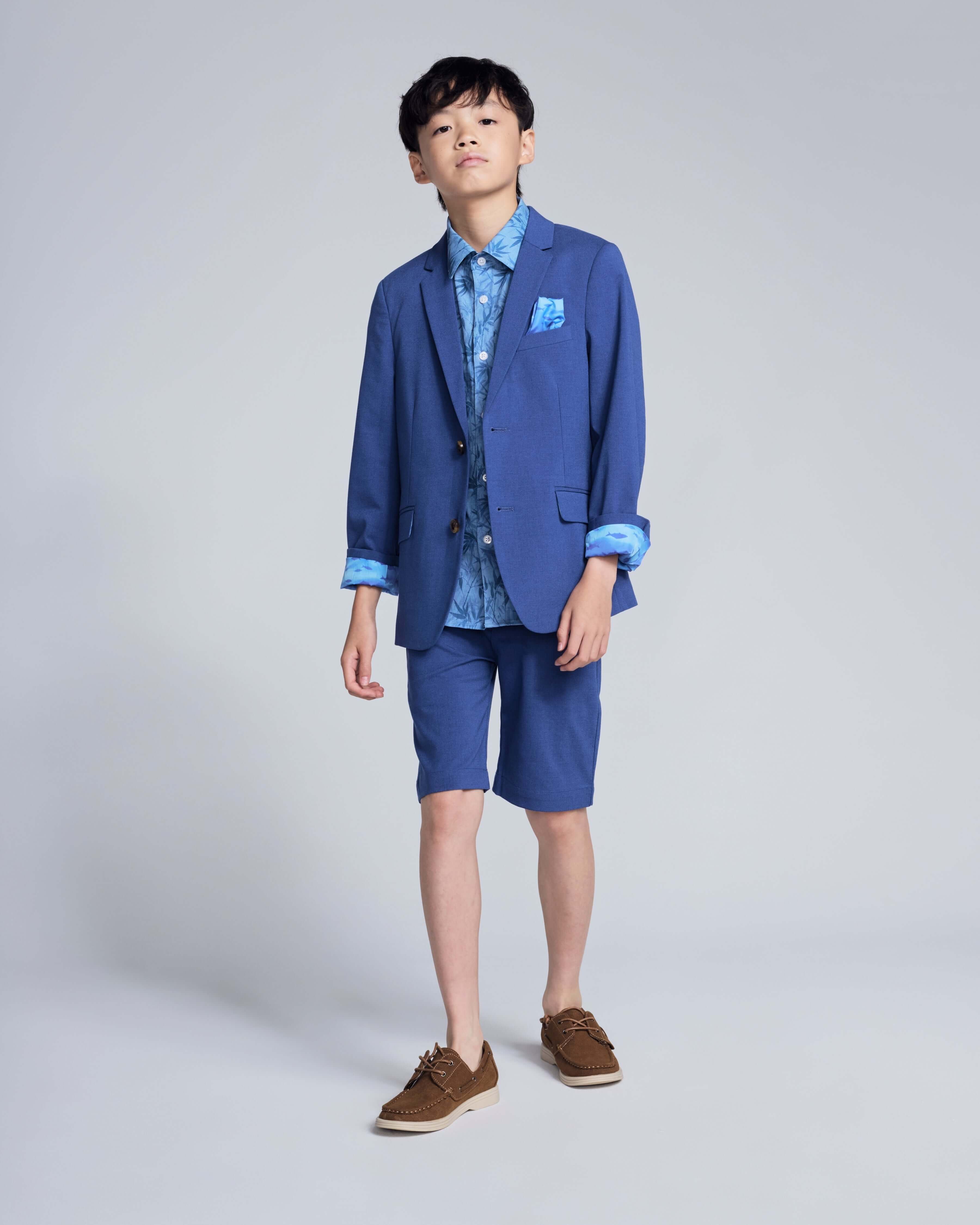 Boy wearing Canopy Blue Trouser Short and matching jacket, showcasing polished summer style and comfort.