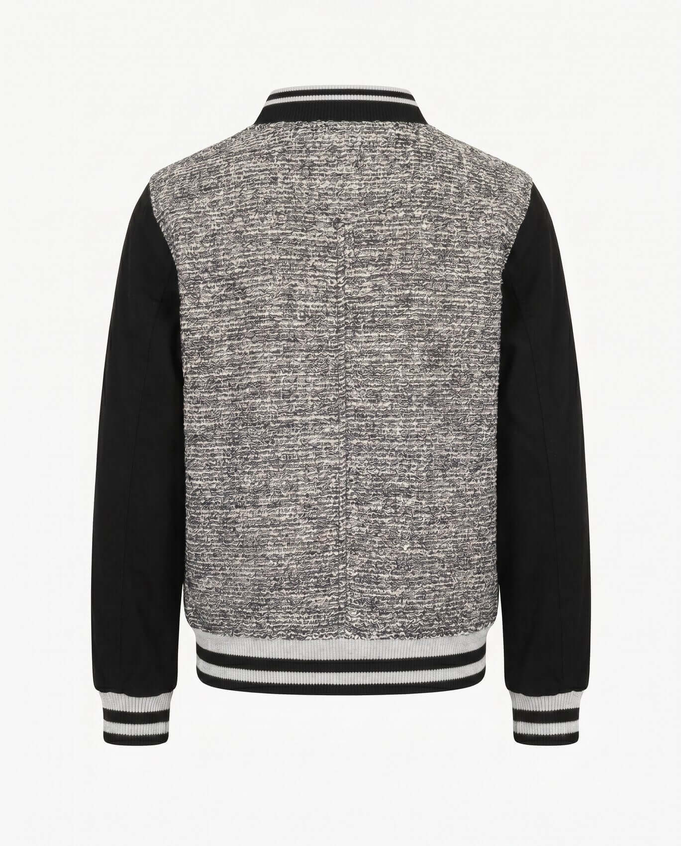 Back view of a black and gray varsity jacket on a white background