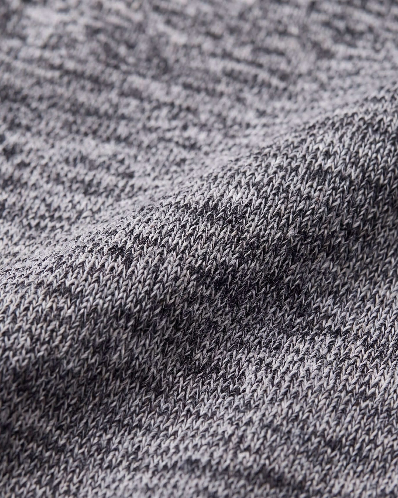 Close-up of gray fabric with a textured pattern