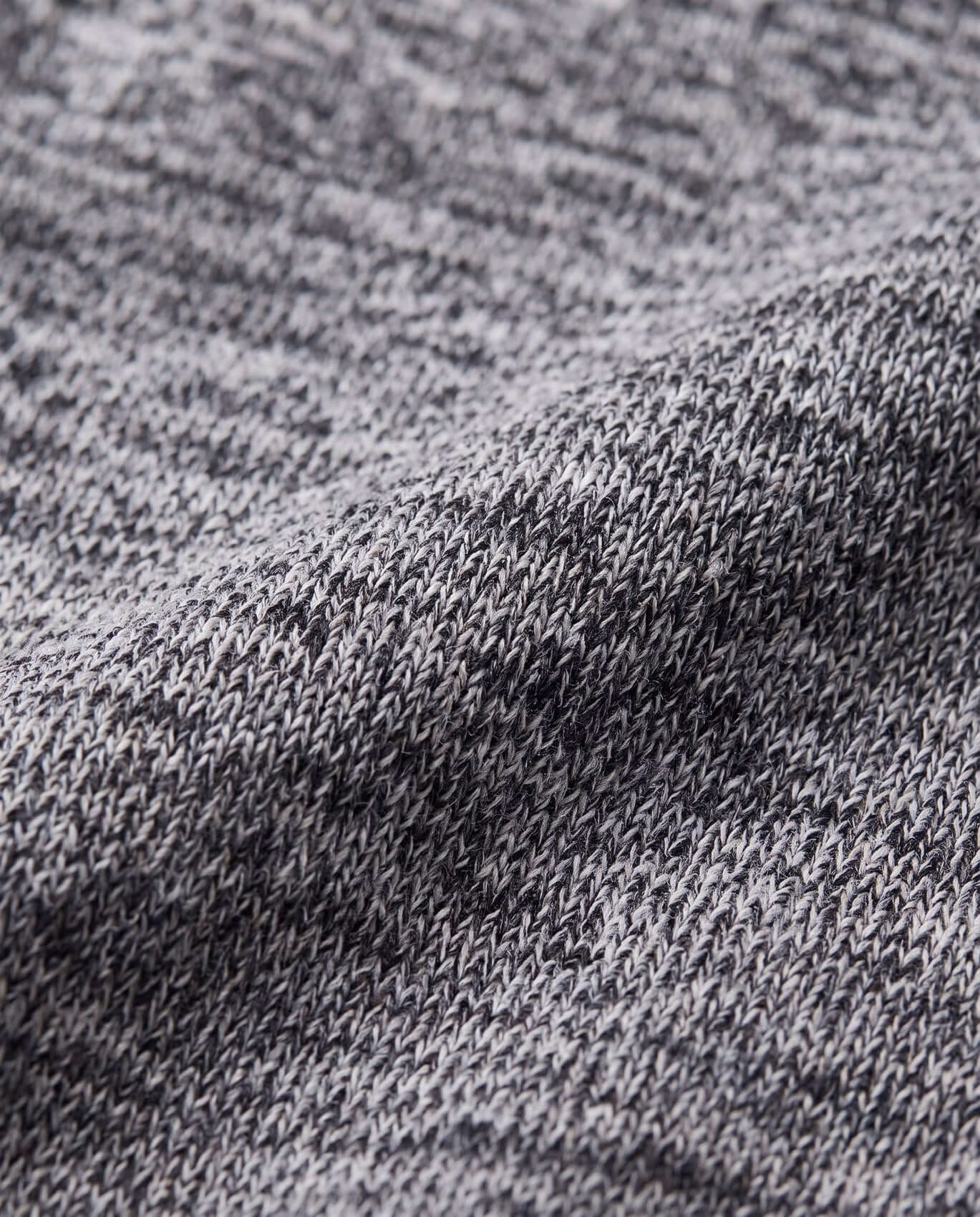 Close-up of gray fabric with a textured pattern