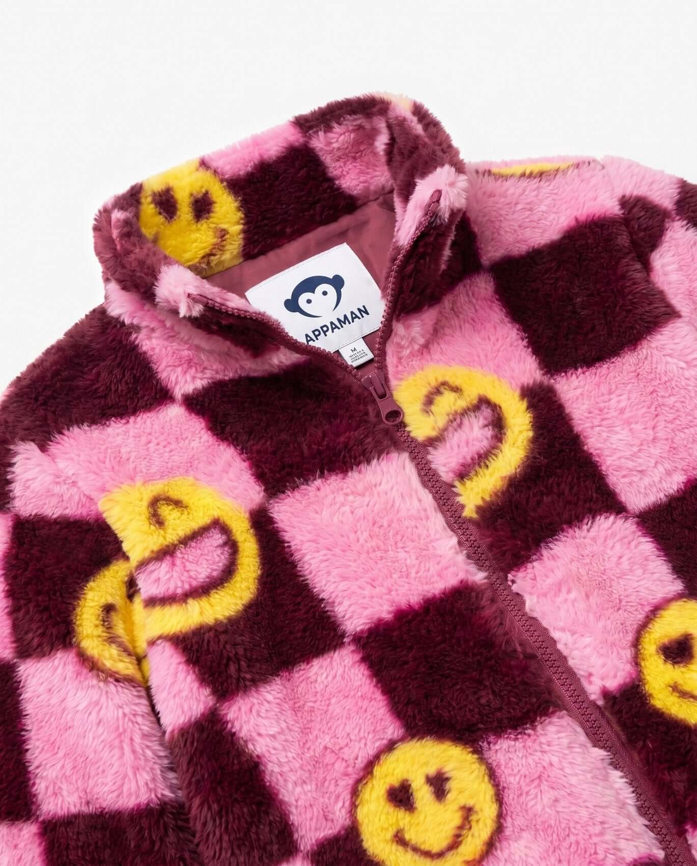 Pink and brown checkered jacket with yellow smiley face patterns, Appaman brand visible.