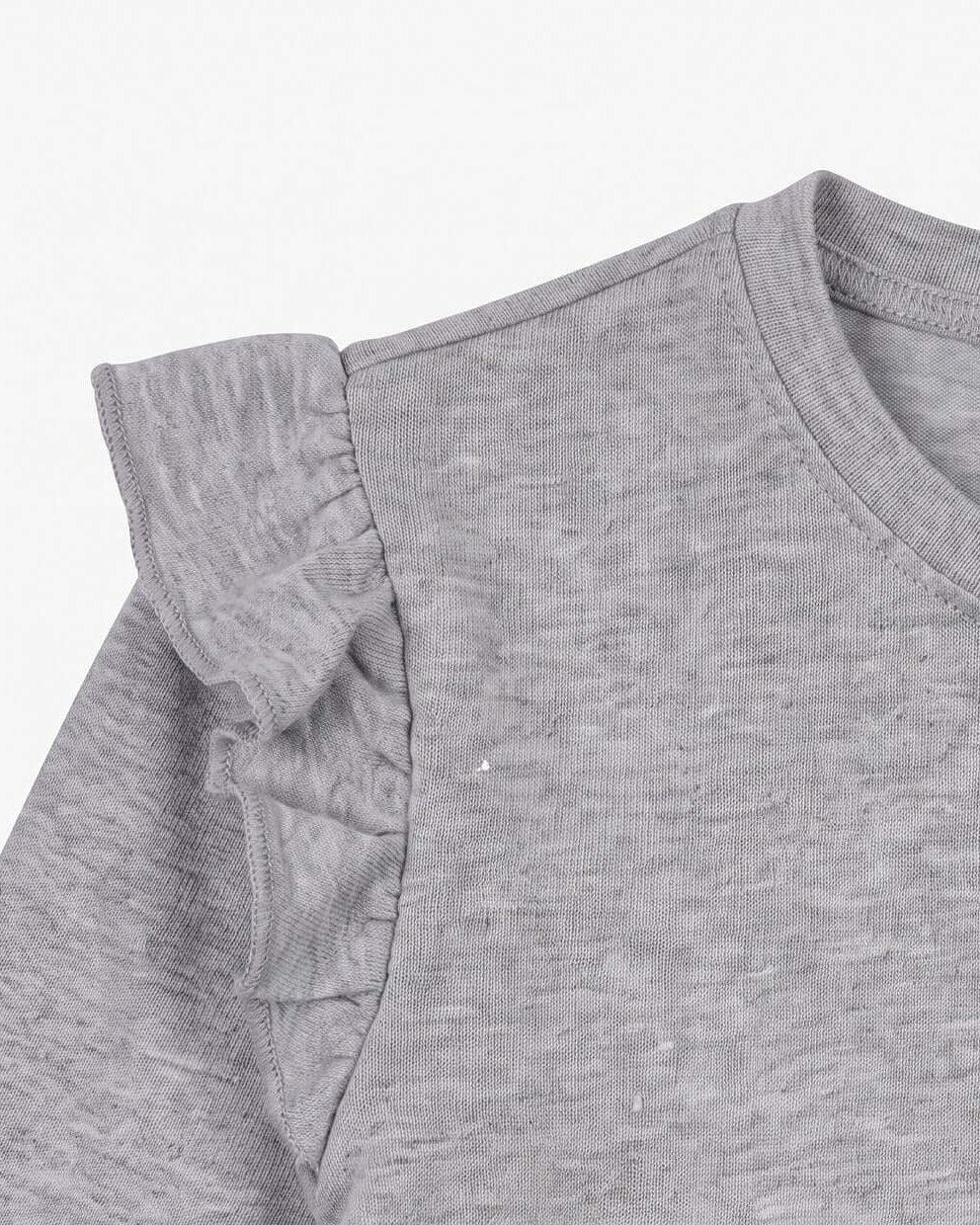 Gray ruffled sleeve on a plain background
