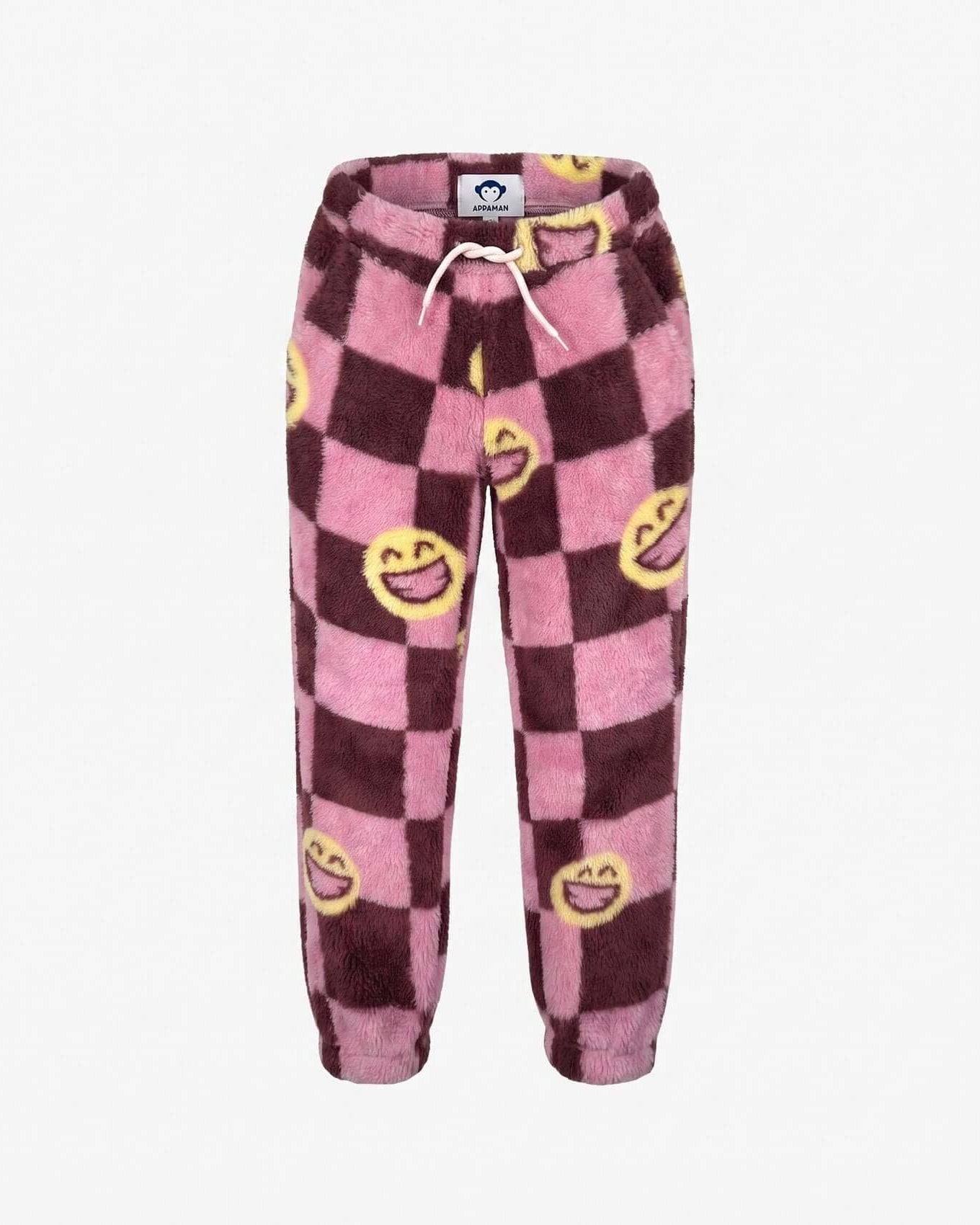 Pink and purple checkered pants with smiley face designs on a white background