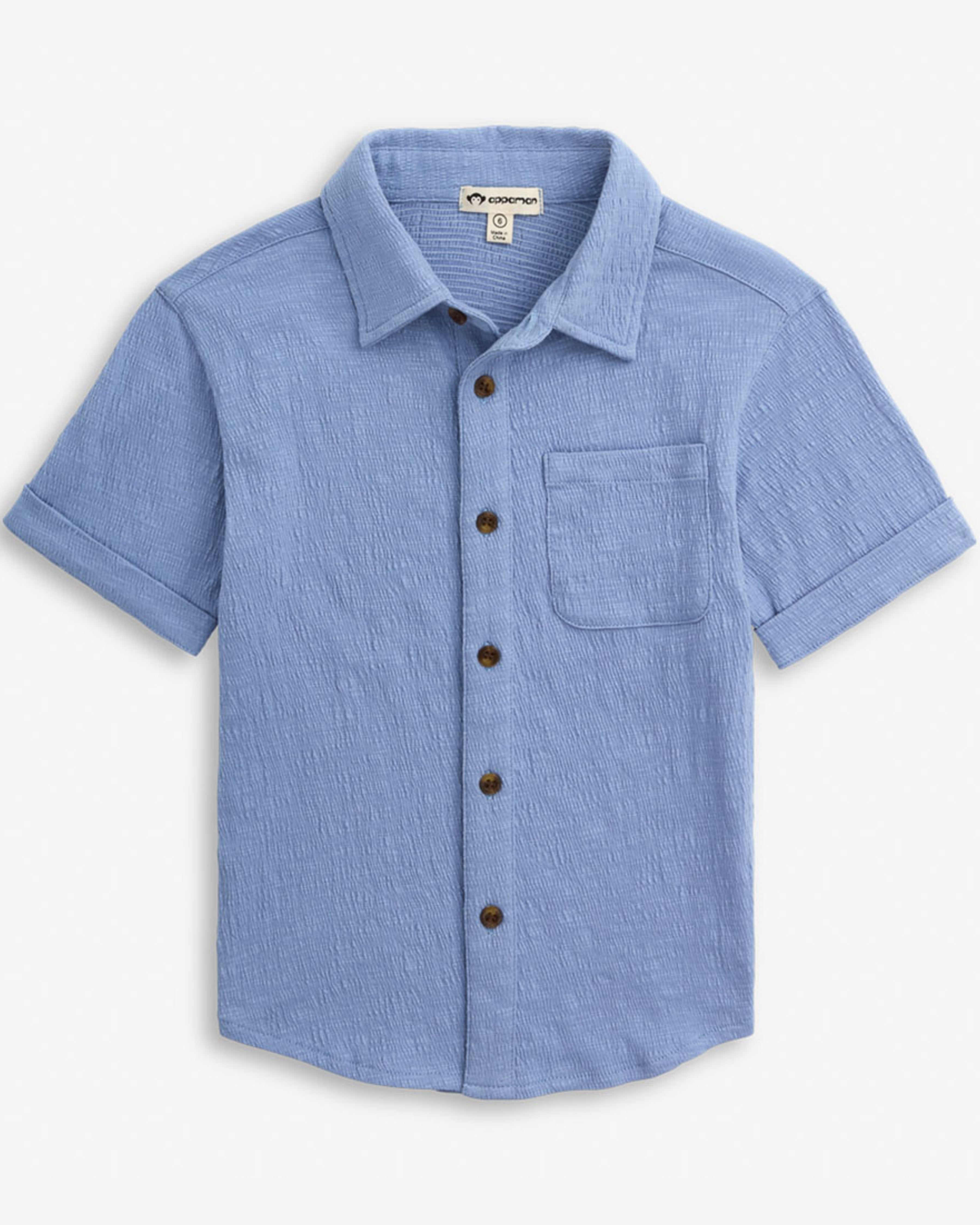 Glacier Lake Beach Shirt in light blue with a classic collar and button details, perfect for warm weather.