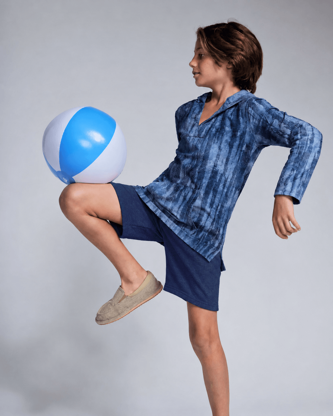 boy in blue shorts