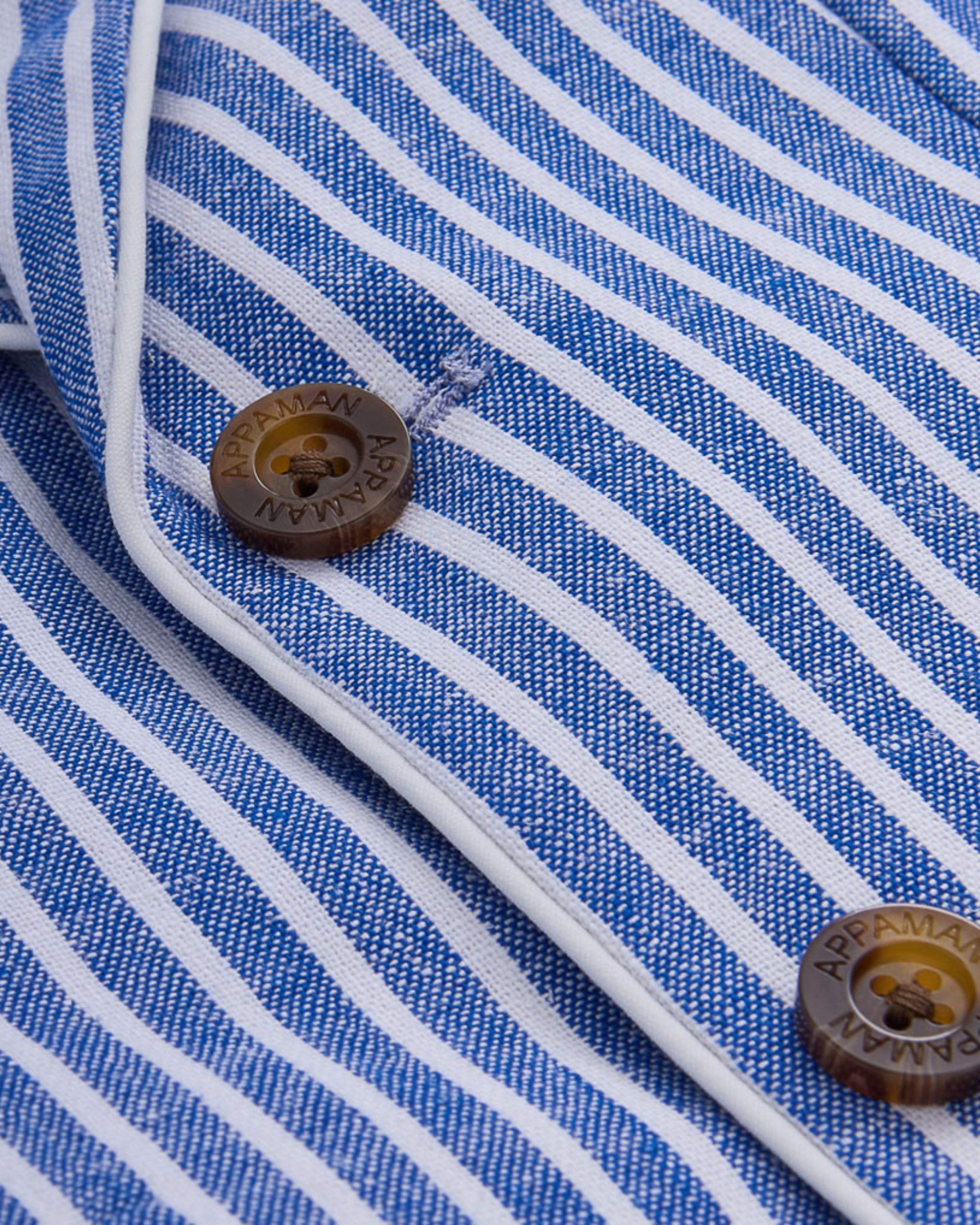 Close-up of buttons and striped fabric of the Linen Canopy Stripe Club Blazer.