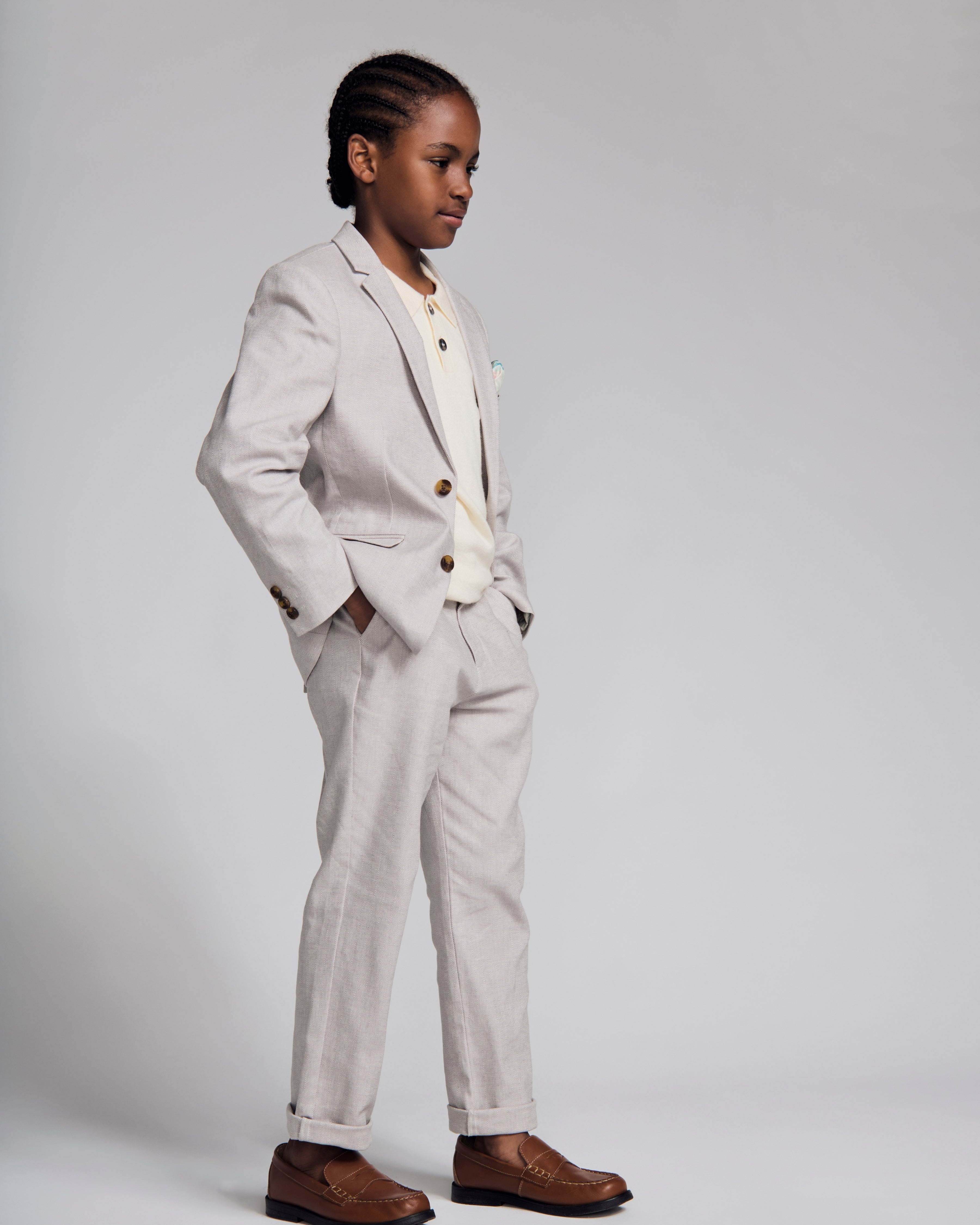 Stylish boy wearing a Linen Grey Beach Pant and sports jacket, perfect for summer events and polished outfits.