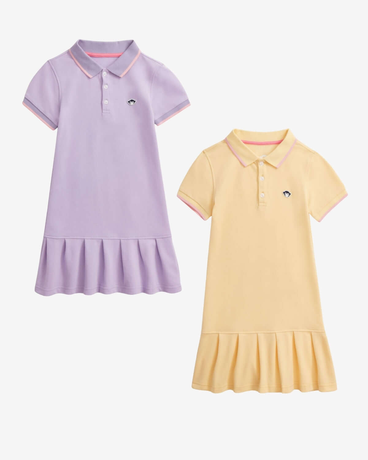 Two polo dresses, one purple and one yellow, on a white background.