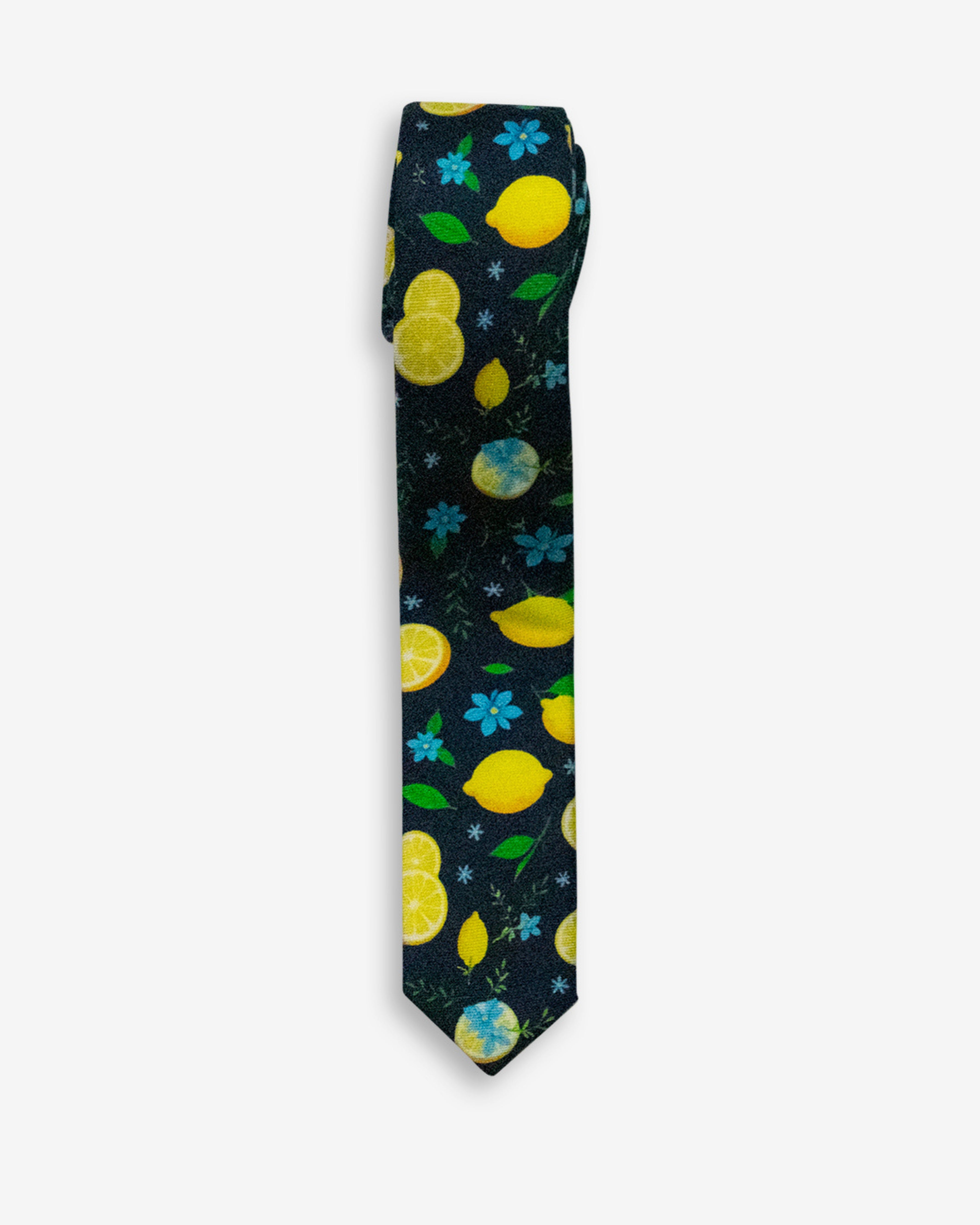 Silk Blue Lemon Zest Tie featuring a vibrant lemon and floral pattern on a dark background.