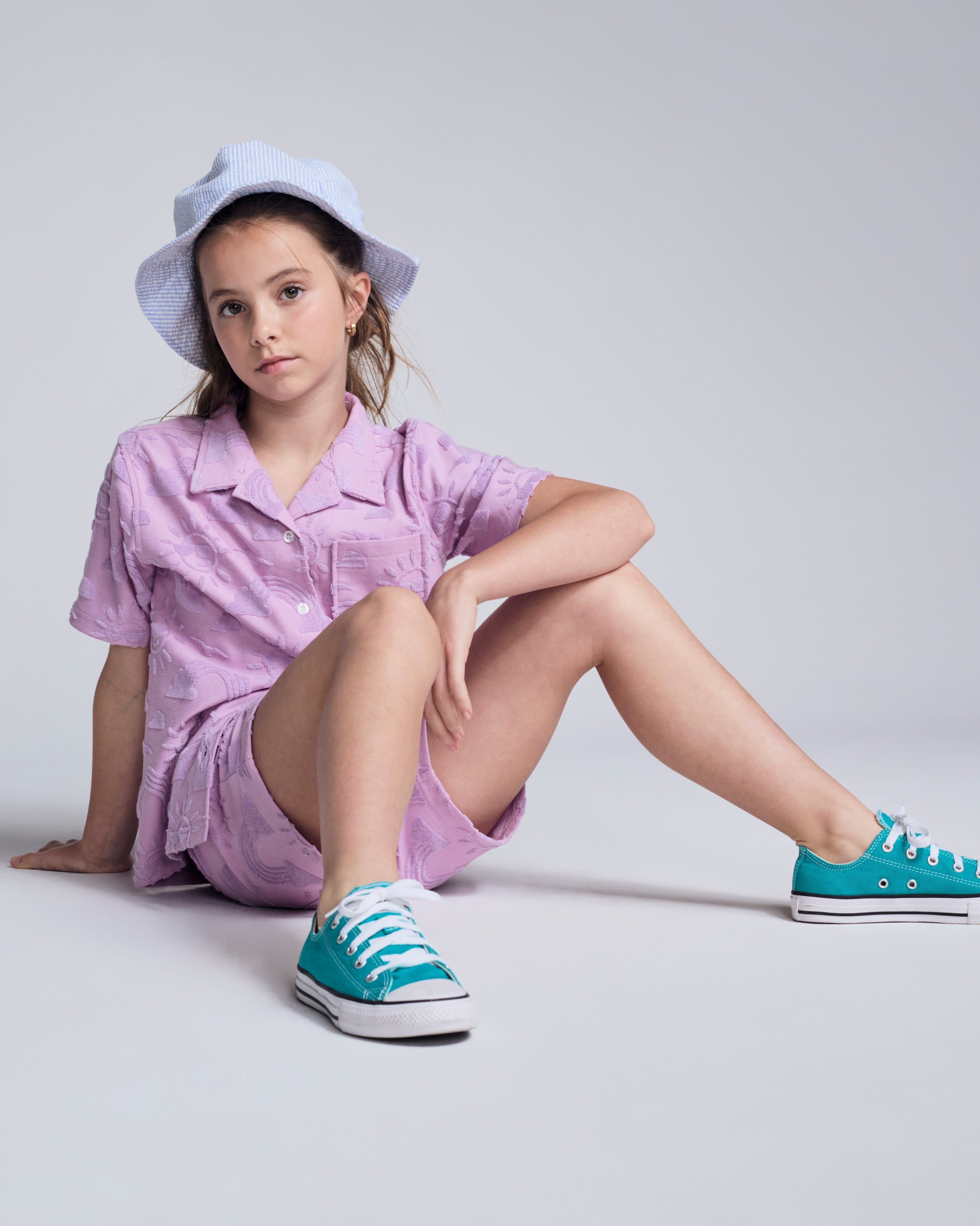 Sunny Days Terry Lilac Resort Short for girls paired with a matching shirt and colorful sneakers.