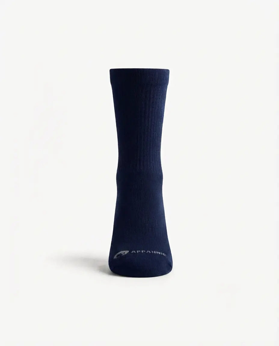 A single navy blue crew sock with a small white 'APPAMAN' logo near the toe, displayed on a clean white background.