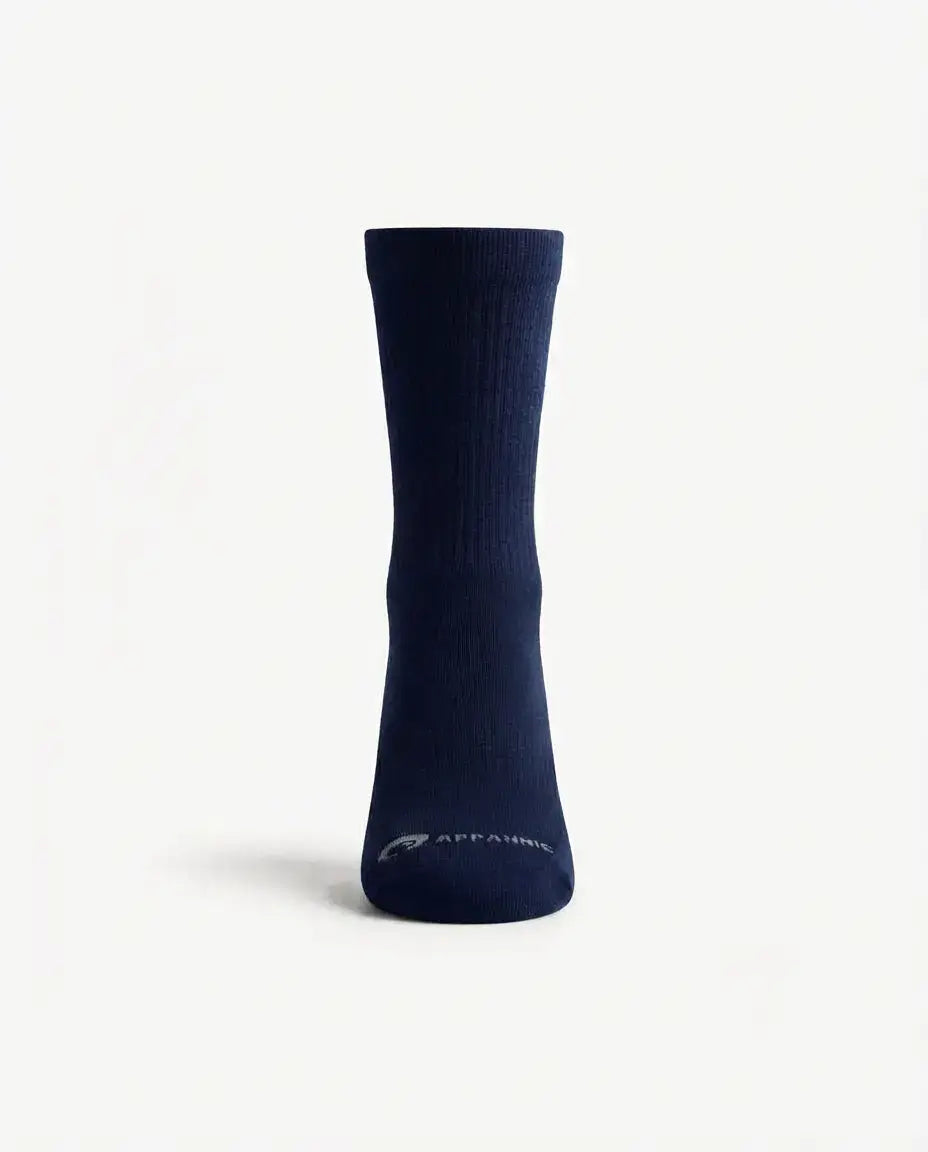 A single navy blue crew sock with a small white 'APPAMAN' logo near the toe, displayed on a clean white background.