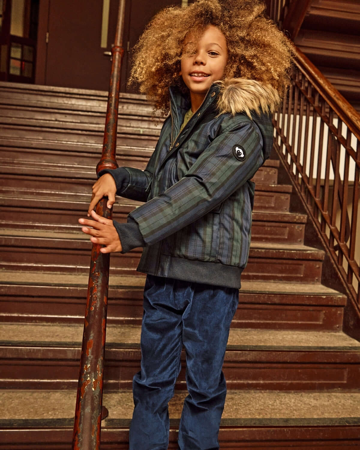 Navy Blue Club Pants paired with a stylish jacket, perfect for kids' everyday adventures.