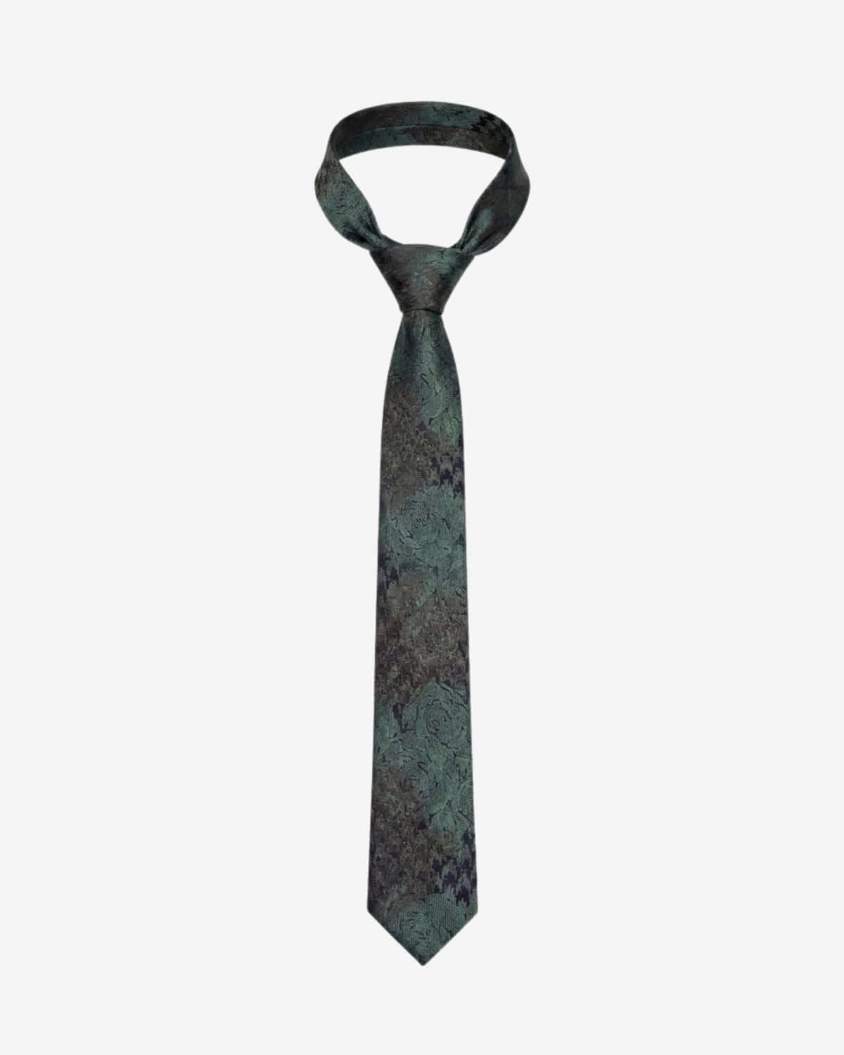 Green patterned tie on a white background