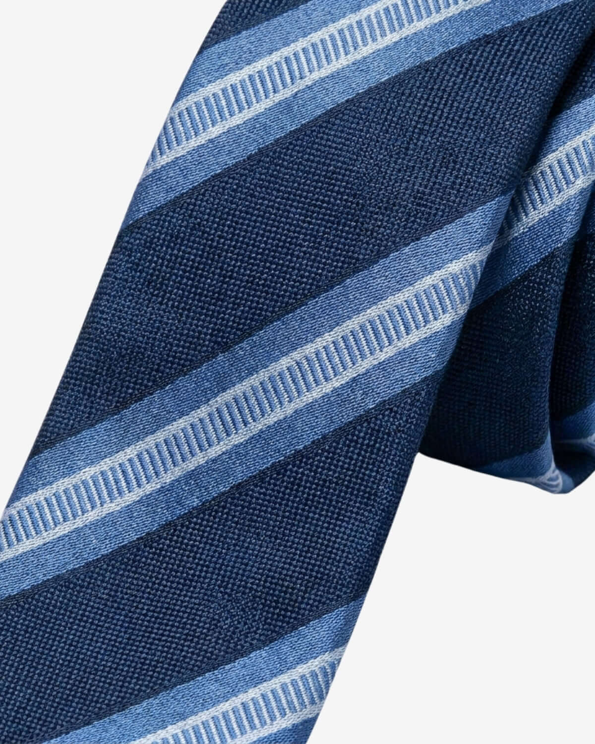 Close-up of a blue and white striped tie on a light gray background