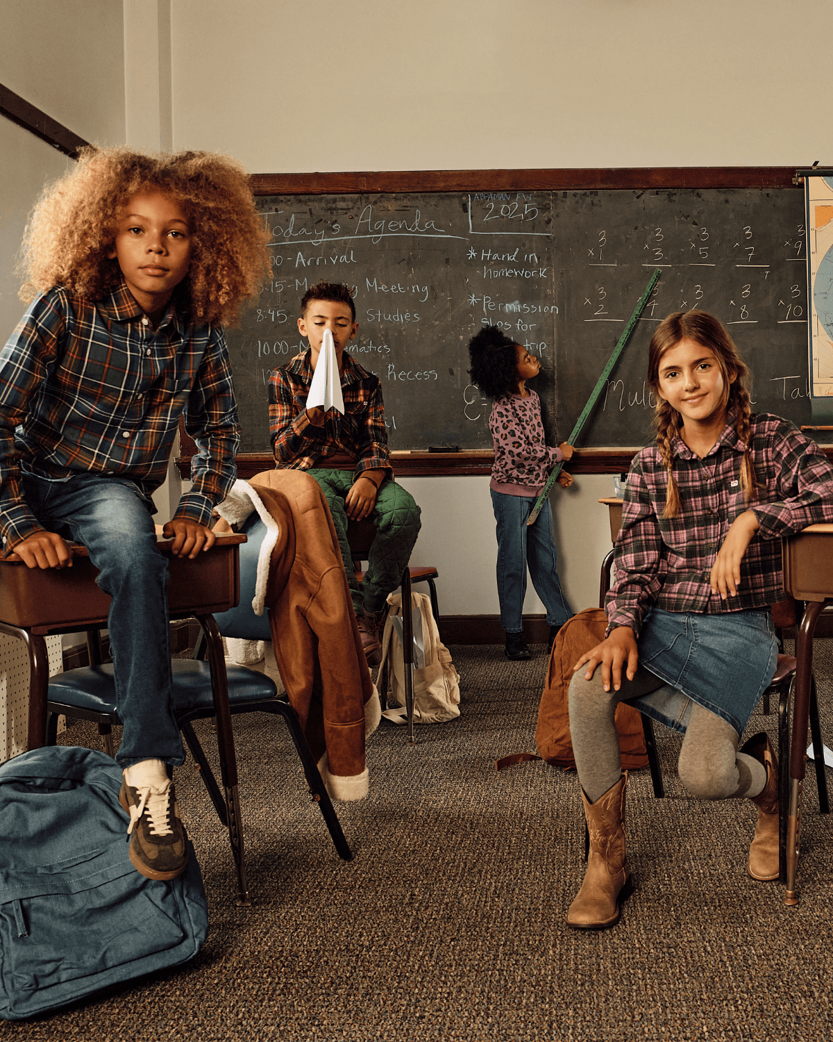 Kids in classroom wearing Lakeside Plaid Standard Button Down shirts, showcasing a fun and stylish school day.
