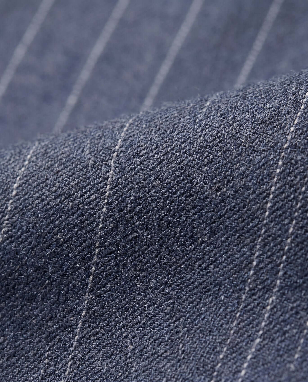 Navy Pinstripe Suit Pants fabric close-up showcasing textured weave and pinstripe detail for stylish kids.