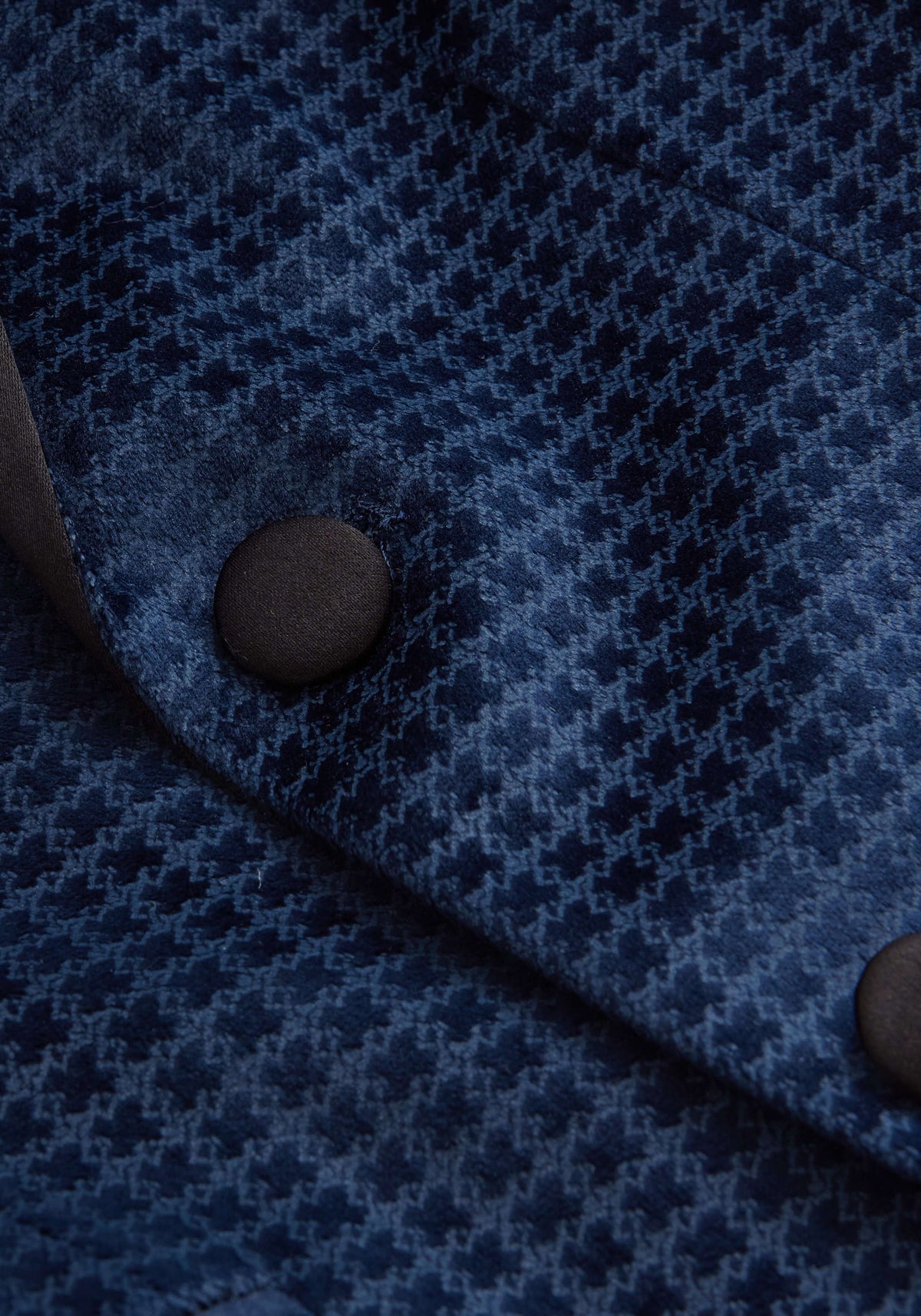 Close-up of the Navy Geo Velvet Tuxedo Jacket showing rich velvet fabric and elegant buttons.