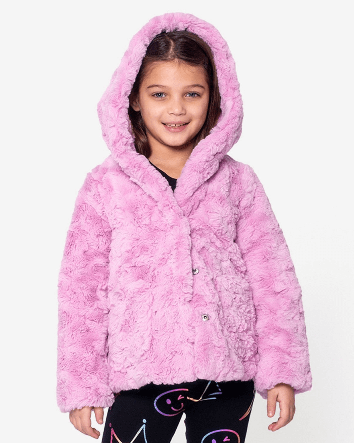 Pink Mousse Cleo Faux Fur Coat displayed on a young girl with a playful smile, featuring a hood and soft pink fabric.